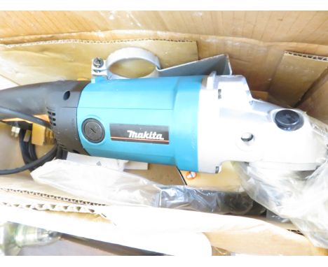 Makita grinder with accessorises, looks to be unused 