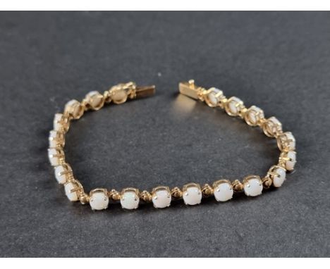 A 9ct gold opal bracelet,&nbsp;18cm. 