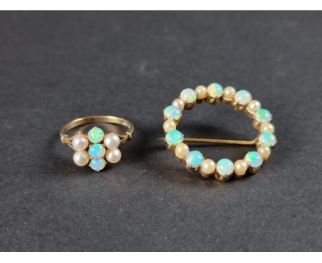 A 9ct gold opal and pearl wreath brooch, 34mm diameter; together with a similar yellow metal ring, stamped 9ct, size N. (2) 