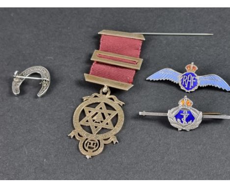 A white metal and enamel RAF sweetheart brooch,&nbsp;stamped silver, 52mm; together with a similar Royal Navy example, 50mm; 