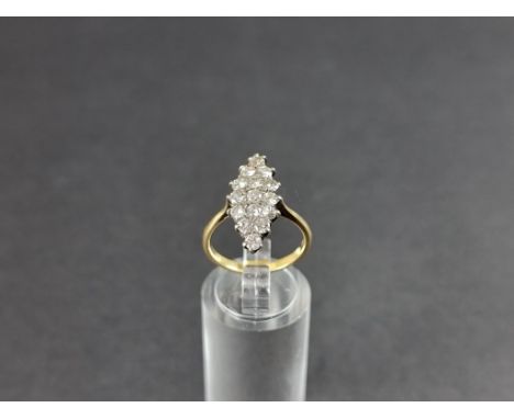 An 18ct gold diamond cluster ring, of marquise shape, set 15 brilliant cut diamonds, size M. 