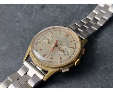 A rare 1960s Cauny Prima gold plated manual wind chronograph wristwatch, 39mm, on later stainless steel bracelet. 