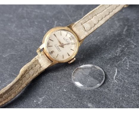 A vintage Sully manual wind ladies wristwatch, 16mm, stamped 18k, on later leather strap. 