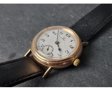 A vintage Omega 9ct gold manual wind trench style wristwatch. 33mm, Serial No. 5333288, hallmarked Birmingham 1923, on replac