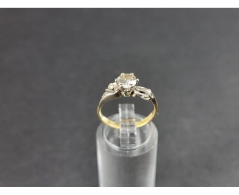 An 18ct gold diamond solitaire ring, of approximately 0.50ct, hallmarked London 1962, size L 1/2-M. 