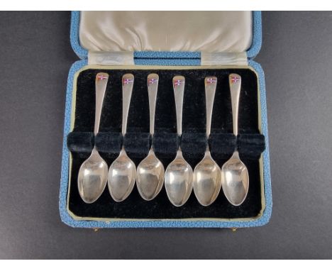 A cased set of six silver and enamel teaspoons, decorated pennants, by&nbsp;George Hardisty, Sheffield 1933, each 10.5cm long