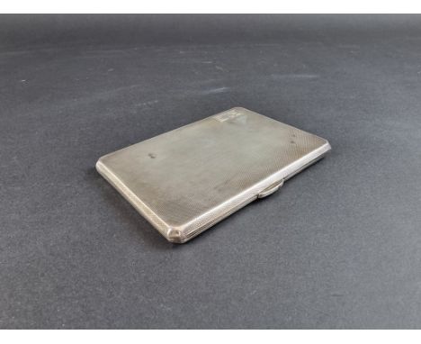 An engine turned silver cigarette case, by&nbsp;W Garner Ltd, Birmingham 1946, 12.5cm, gross weight 214g. 