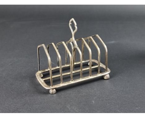 A Victorian silver seven bar toast rack, by&nbsp;William Hutton &amp; Sons, Sheffield 1889, 13.5cm, 213g. 