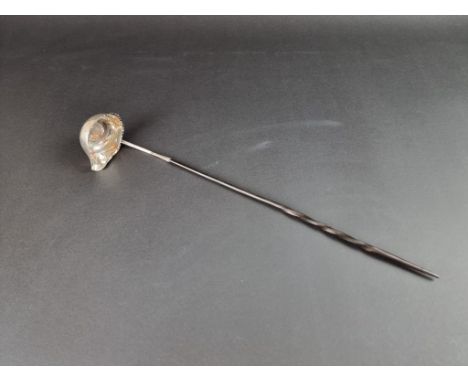 A baleen handled white metal toddy ladle, inset William III 1696 silver shilling. 