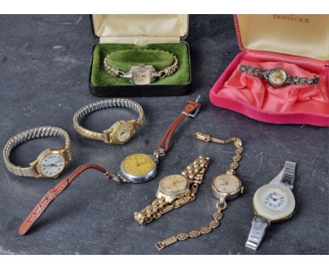 A 1930s Rolex Marconi plated ladies manual wind wristwatch, 26mm, on leather strap; together with seven other ladies wristwat
