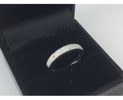 A 9ct white gold diamond set ring. Approx weight 2.26 grams. Size J.