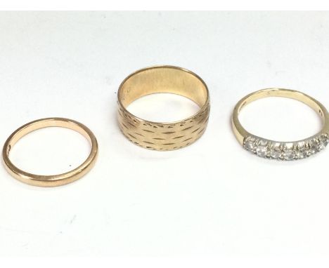 Three 9 carat gold rings, size K/L, P, P/Q. 8g. Postage cat A
