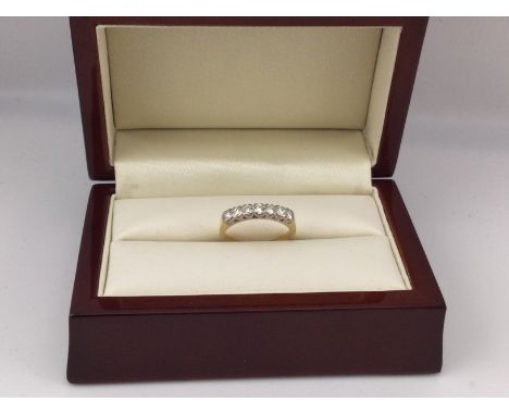 A yellow metal stone set ring approx weight 2.95 grams. Approx size K.