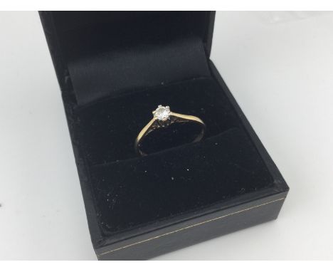 An 18ct gold diamond solitaire ring. Size K.
