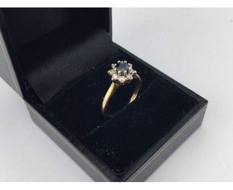 An 18ct gold sapphire and diamond set ring approx weight 3.33grams, size K.