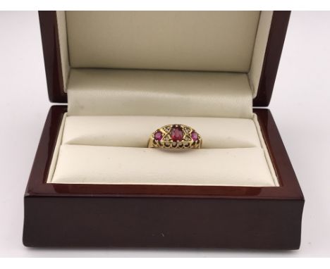 An 18ct diamond and Ruby set ring. Approx weight 2.70 grams, approx size J.