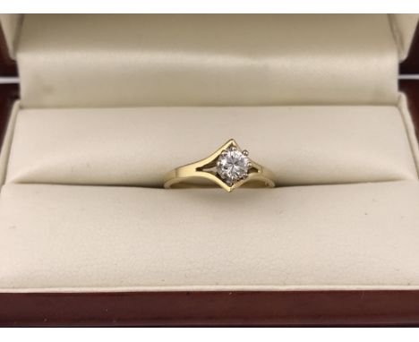 An 18ct gold diamond set solitaire ring approx 2.4 grams. Approx diamond weight 0.25cts, approx size k.