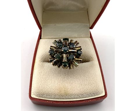 A 9ct gold (tested) and sapphire stone set dress ring. Size N (A)