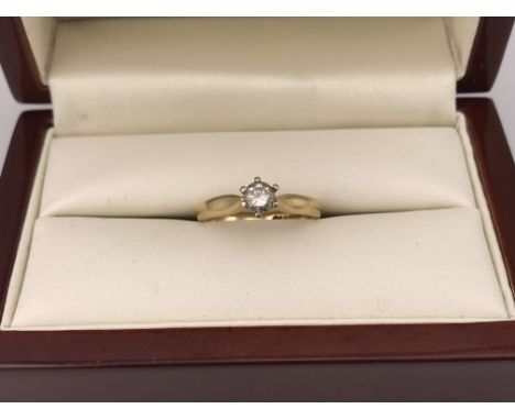 An 18ct yellow gold diamond set solitaire ring, approx 0.30cts. Approx weight 3.24 grams, approx size K.