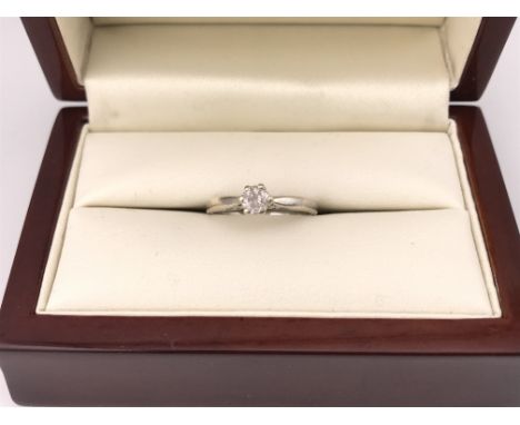 A 9ct white gold solitaire ring. Approx weight 2.24 grams, approx size M.