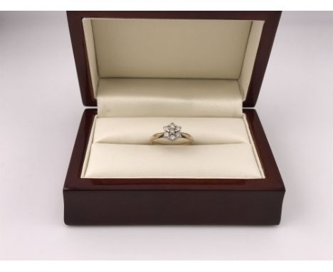 A 9ct gold flower style diamond cluster ring. Approx weight 1.8grams, approx size K1/2.