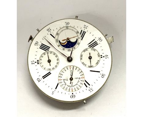 A Pocket watch movement with enamel dial, perpetual calendar, moon phases and minute repeater, unmarked Patek Philipe model. 