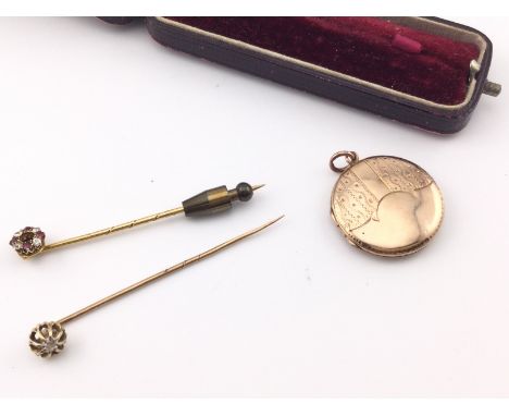 Two Edwardian stick pins and a 9ct gold locket 3.42 Postage B