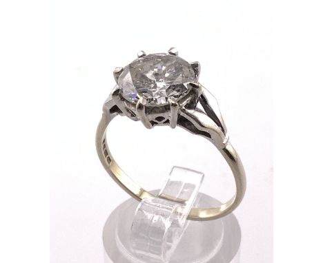 A large approx 2.75ct solitare diamond ring. (Diameter 10mm x 4.5mm approximately) some inclusions, with 18ct gold ring mount