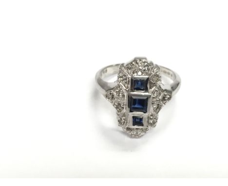 14ct white gold art deco style sapphire and diamond ring. Step cut sapphires approx 0.40ct and 0.18ct diamond. Size K Postage