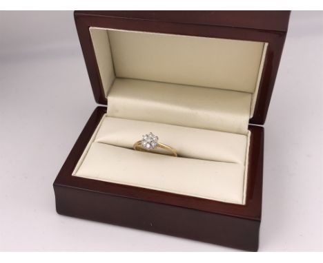An 18ct gold diamond cluster ring. Approx weight 2.41 grams , approx size P.
