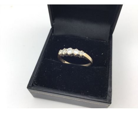 A 9ct gold diamond set ring. Approx size p.