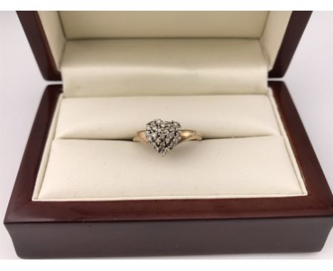 A 9ct diamond heart cluster ring. Approx weight 2.52 grams, approx size P.