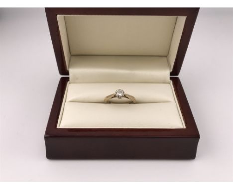 A 9ct go,d solitaire ring set with a 0.25ct diamond. Approx weight 2.4grams, approx size L.
