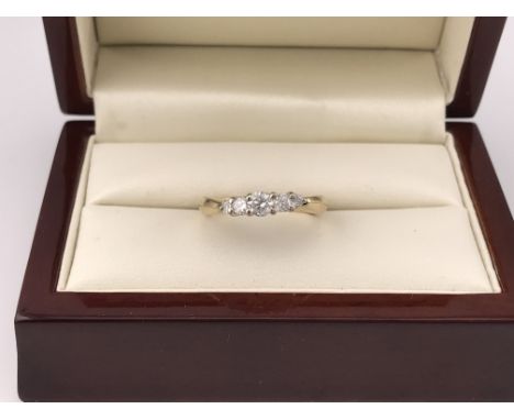 A 14ct gold five stone graduating diamond ring. Approx weight 4 grams, Approx size N.