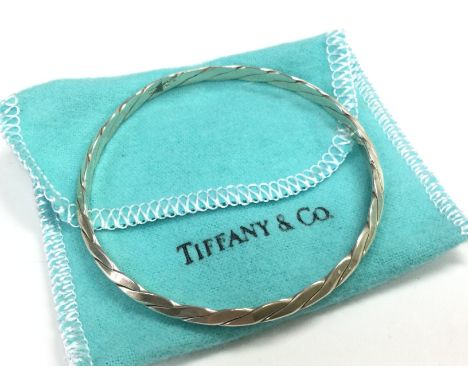A silver Tiffany and Co twisted rope bangle. Postage category A