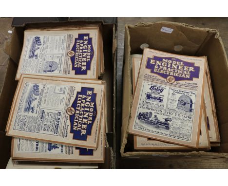 A large quantity of 1930s model engineer and practical electrician magazines in two boxes.
