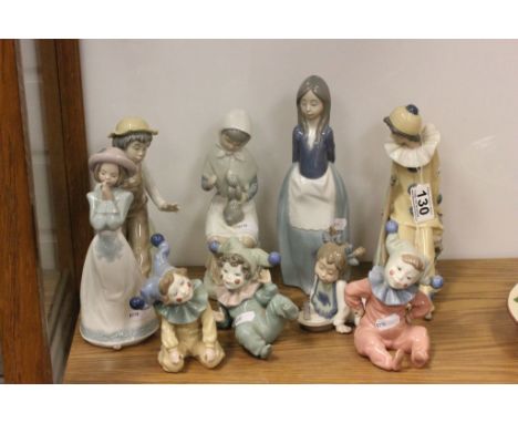 Collection of nine Nao ceramic figures to include child Clowns