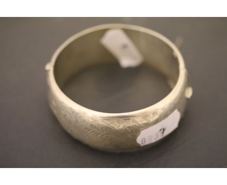 Hallmarked Silver bangle with engraved decoration