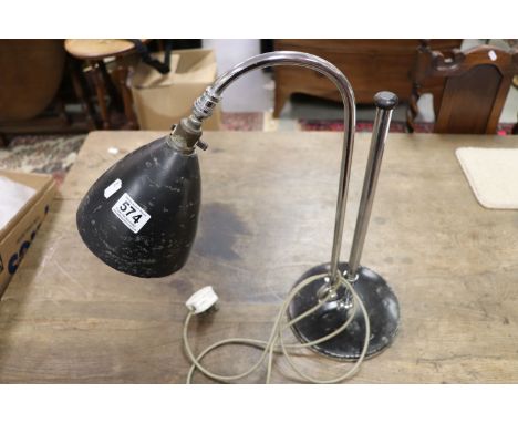 A vintage retro adjustible lamp.