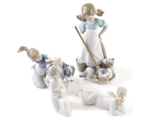 A Lladro figure of a girl holding broom, and another washing puppy, printed marks beneath and other Nao figures. (a quantity,