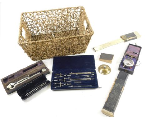 Various measuring devices, rulers, part geometry set, various other items contained in a wicker basket, 37cm wide. (a quantit