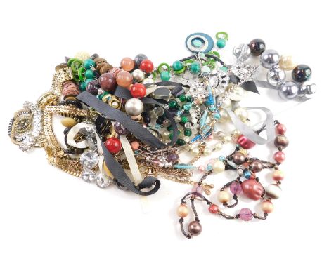 A group of modern costume jewellery, comprising chunky beaded and wooden necklaces, faux pearl necklaces, crystal style neckl