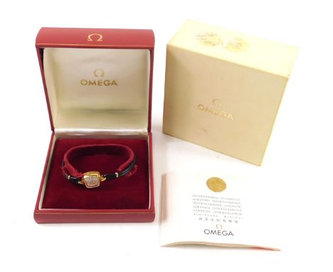 A Omega cocktail watch, with shaped square face, with 0.8cm dial, baton pointers, mother of pearl coloured face, black leathe