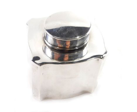 An Edward VII silver tea caddy, of shaped rectangular form with plain oval lid, Chester probably 1908, 10cm high, 4.68oz. 