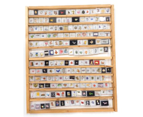 Various enamel and other badges, to include flags, Union Jack 2cm high, butterfly, health and wellbeing, Minion, etc. (1 case