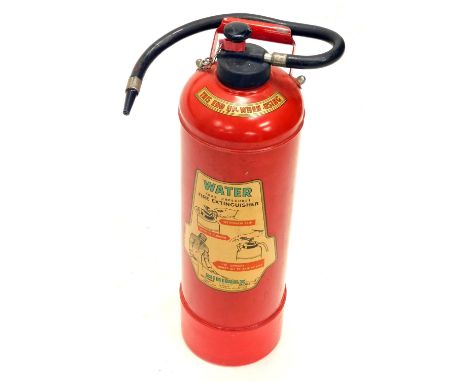 A vintage Minimax fire extinguisher, in red with black trim, 69cm high. 