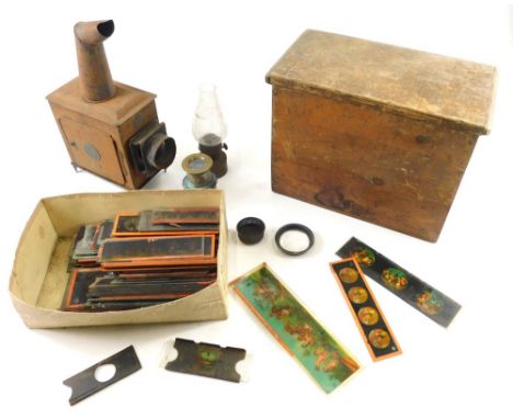 Various vintage magic lantern slides, early 20thC and other various subjects and a magic lantern. (a quantity)