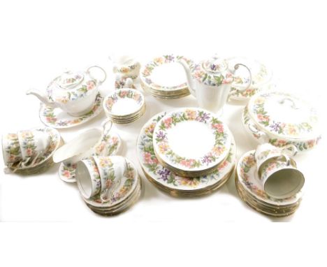 A comprehensive Paragon Country Lane pattern part dinner service, to include a pair of lidded tureens, 28cm wide, serving pla
