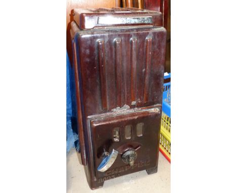 An enamelled stove in maroon with chrome handles, by Chappée (some damage to enamel)