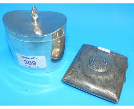 A hallmarked silver oval tea caddy with hinged lid (marks worn) London 1915, 3.6oz; a jewelled cigarette case Birmingham 1903